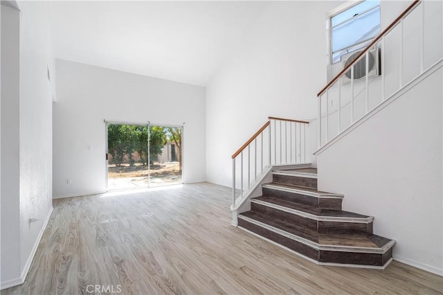 44738 Foxboro Ct, Lancaster, CA 93535 - staircase featuring wood finished floors