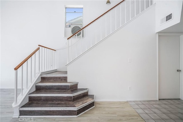 44738 Foxboro Ct, Lancaster, CA 93535 - staircase featuring wood finished floors