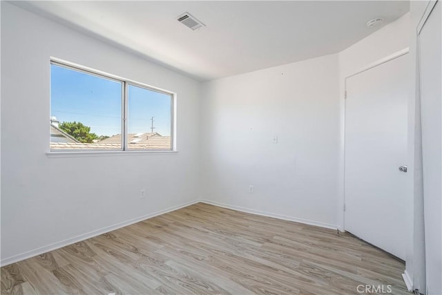 44738 Foxboro Ct, Lancaster, CA 93535 - spare room featuring light wood-type flooring and a smoke detector