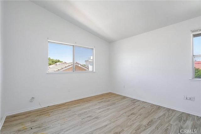 44738 Foxboro Ct, Lancaster, CA 93535 - empty room featuring wood finished floors and lofted ceiling