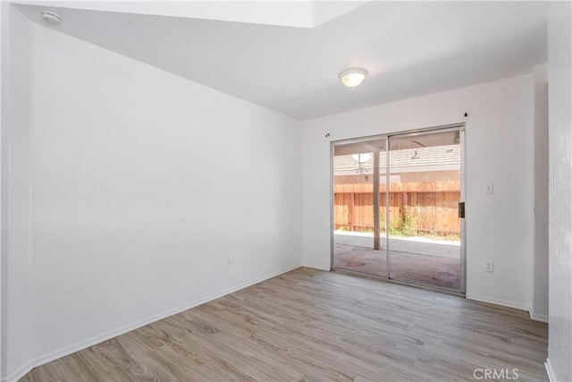 44738 Foxboro Ct, Lancaster, CA 93535 - unfurnished room with light wood-style floors and a smoke detector