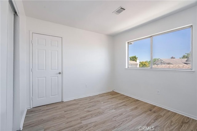 44738 Foxboro Ct, Lancaster, CA 93535 - spare room with light wood-style flooring and baseboards