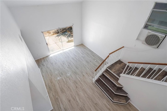 44738 Foxboro Ct, Lancaster, CA 93535 - stairs featuring wood finished floors