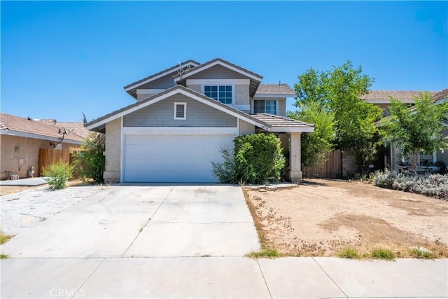 44738 Foxboro Ct, Lancaster, CA 93535 - view of front of property featuring concrete driveway, a garage, and stucco siding