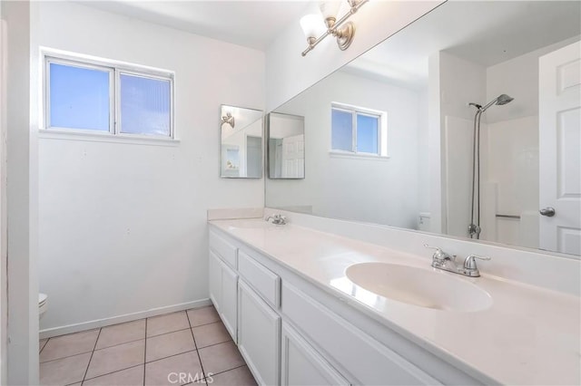 44738 Foxboro Ct, Lancaster, CA 93535 - full bath featuring double vanity, tile patterned flooring, and a shower