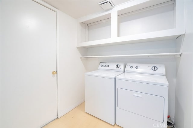 44738 Foxboro Ct, Lancaster, CA 93535 - washroom featuring washer and clothes dryer and light floors