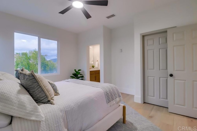 2850 Palmetto Point Ct, Chula Vista, CA 91915 - bedroom featuring light wood-type flooring, a ceiling fan, and ensuite bathroom