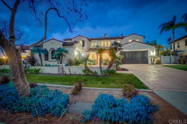 2850 Palmetto Point Ct, Chula Vista, CA 91915 - mediterranean / spanish-style house featuring concrete driveway, stucco siding, and an attached garage