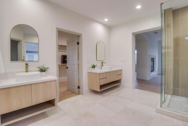 2850 Palmetto Point Ct, Chula Vista, CA 91915 - full bath featuring two vanities, a shower stall, and recessed lighting