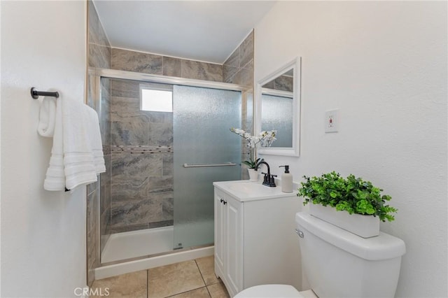 1048 S Record Ave, East Los Angeles, CA 90023 - bathroom featuring vanity, a shower stall, and tile patterned floors