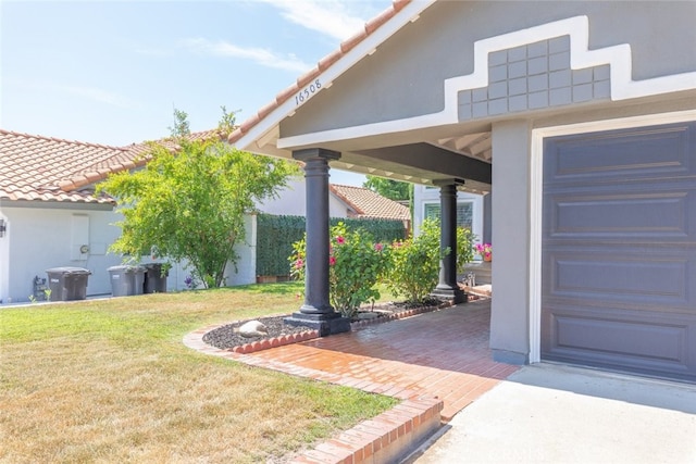 16508 Nectarine Way, Lake Elsinore, CA 92530 - view of grassy yard featuring a garage