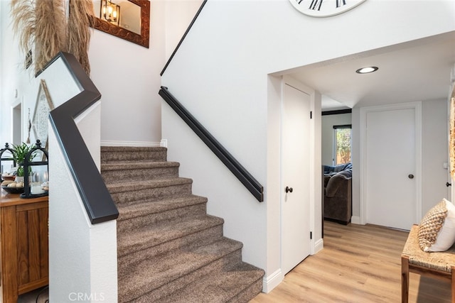 16508 Nectarine Way, Lake Elsinore, CA 92530 - stairs featuring wood finished floors and recessed lighting