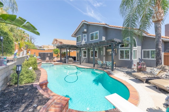 16508 Nectarine Way, Lake Elsinore, CA 92530 - view of swimming pool featuring a pergola, a fenced backyard, a patio, a pool with connected hot tub, and a diving board
