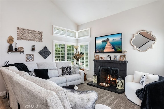 16508 Nectarine Way, Lake Elsinore, CA 92530 - living area featuring a fireplace, high vaulted ceiling, and carpet