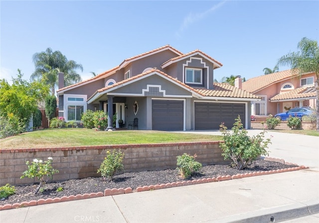16508 Nectarine Way, Lake Elsinore, CA 92530 - view of front of house with stucco siding, a garage, a tiled roof, a front yard, and driveway