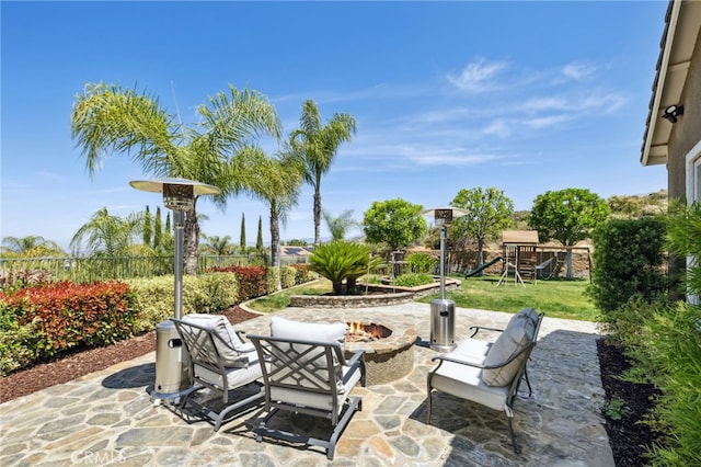 36472 County Line Rd, Yucaipa, CA 92399 - view of patio / terrace with a fire pit and a playground