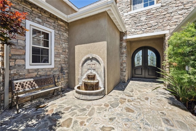 36472 County Line Rd, Yucaipa, CA 92399 - entrance to property featuring french doors, stone siding, and stucco siding
