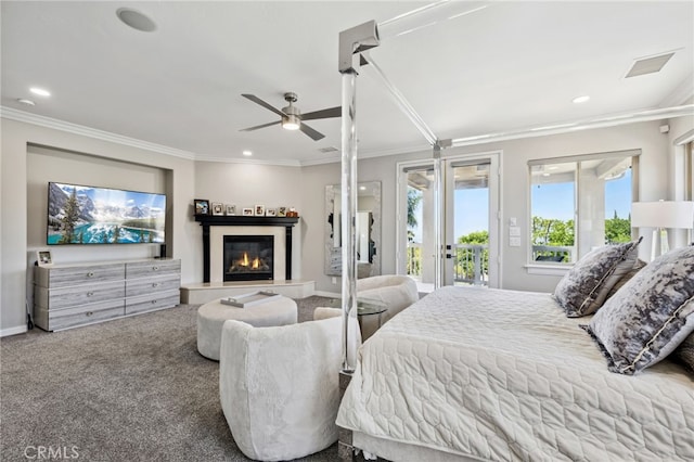 36472 County Line Rd, Yucaipa, CA 92399 - bedroom with access to exterior, ornamental molding, a glass covered fireplace, recessed lighting, and carpet floors