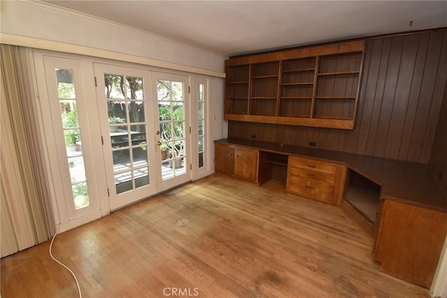 565 N Laurel Ave, Upland, CA 91786 - unfurnished office with french doors, built in desk, light wood-style floors, and crown molding
