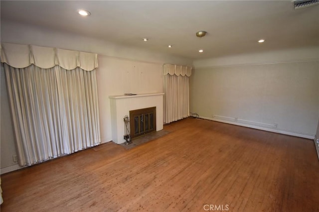 565 N Laurel Ave, Upland, CA 91786 - unfurnished living room featuring wood finished floors, a fireplace with flush hearth, and recessed lighting