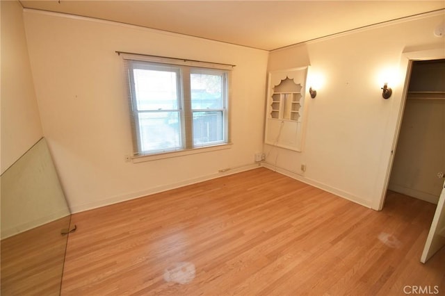 565 N Laurel Ave, Upland, CA 91786 - empty room featuring light wood-style flooring and baseboards