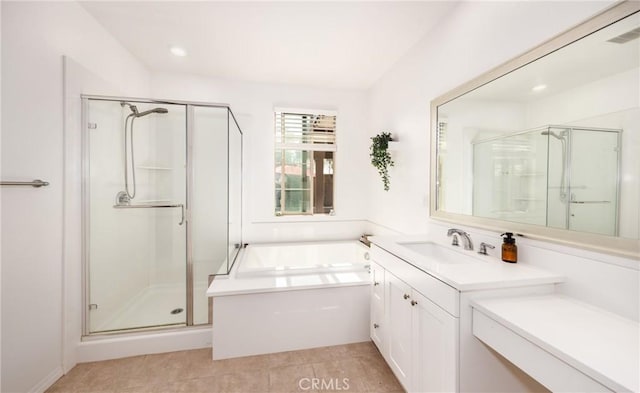 10963 Clementine Way, Loma Linda, CA 92354 - full bathroom featuring a stall shower, vanity, a garden tub, tile patterned floors, and recessed lighting