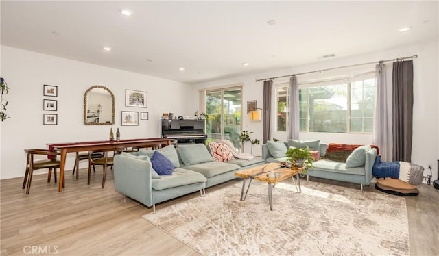 10963 Clementine Way, Loma Linda, CA 92354 - living area with light wood-type flooring and recessed lighting