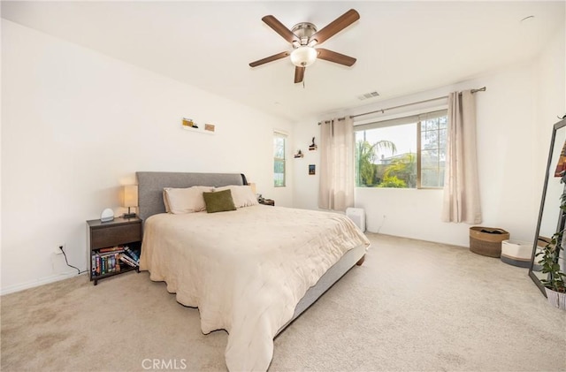 10963 Clementine Way, Loma Linda, CA 92354 - bedroom with light colored carpet and a ceiling fan