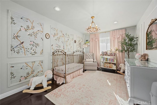11900 Laughton Way, Porter Ranch, CA 91326 - bedroom with a chandelier, a nursery area, wood finished floors, and recessed lighting