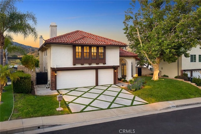 11900 Laughton Way, Porter Ranch, CA 91326 - mediterranean / spanish house featuring a garage, a chimney, a tile roof, and concrete driveway