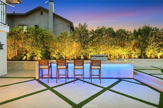11900 Laughton Way, Porter Ranch, CA 91326 - patio terrace at dusk with a patio area