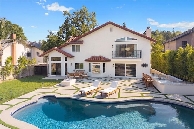 11900 Laughton Way, Porter Ranch, CA 91326 - rear view of house with a balcony, stucco siding, a patio area, and a chimney