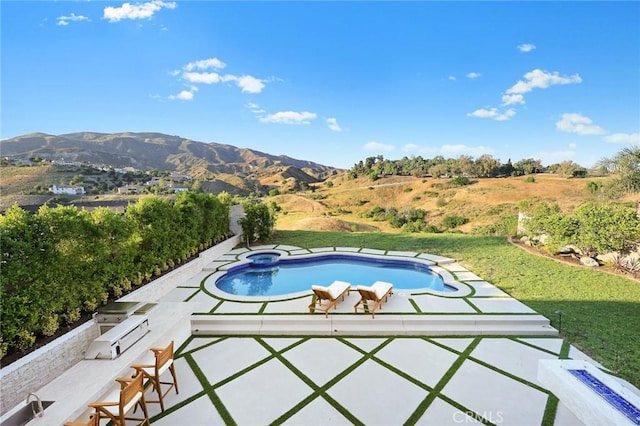 11900 Laughton Way, Porter Ranch, CA 91326 - view of swimming pool with a mountain view, a pool with connected hot tub, and a yard