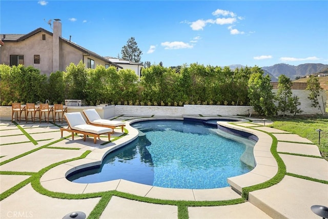 11900 Laughton Way, Porter Ranch, CA 91326 - view of pool with a patio area and a mountain view