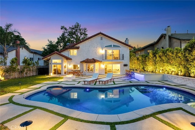 11900 Laughton Way, Porter Ranch, CA 91326 - pool at dusk with a patio