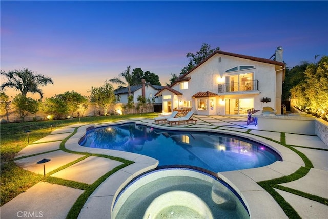 11900 Laughton Way, Porter Ranch, CA 91326 - view of swimming pool featuring a patio area and a pool with connected hot tub