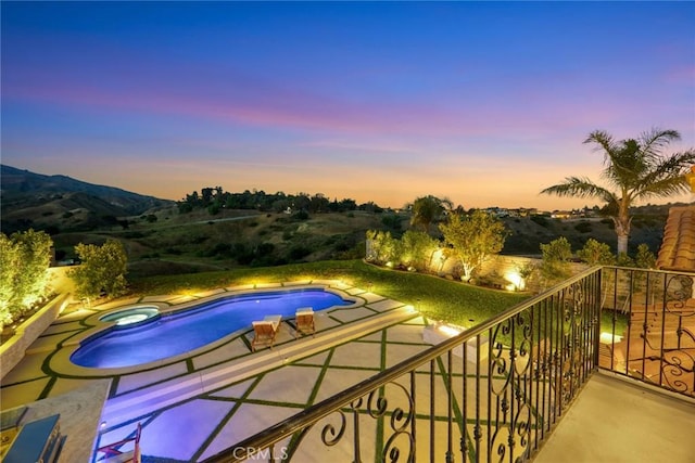 11900 Laughton Way, Porter Ranch, CA 91326 - pool at dusk with a pool with connected hot tub