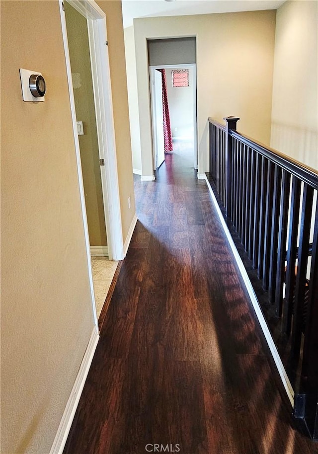 15048 Westin Ln, La Mirada, CA 90638 - hallway featuring wood finished floors and an upstairs landing