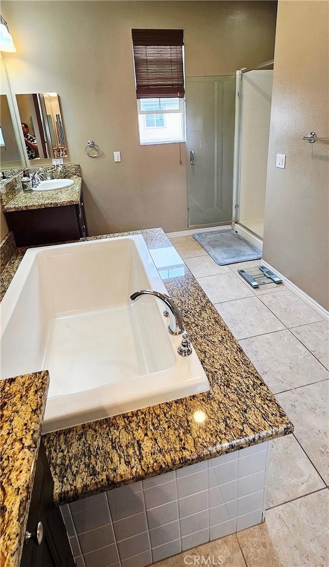 15048 Westin Ln, La Mirada, CA 90638 - bathroom featuring a bath, vanity, tile patterned flooring, and a stall shower