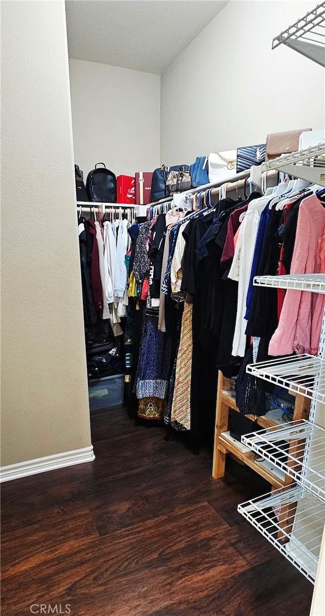 15048 Westin Ln, La Mirada, CA 90638 - spacious closet with wood finished floors