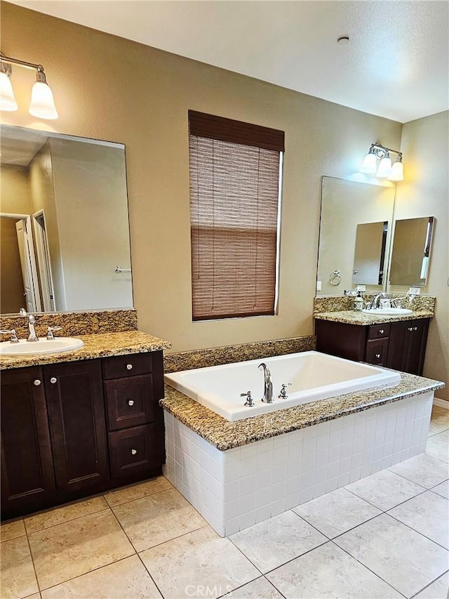 15048 Westin Ln, La Mirada, CA 90638 - bathroom featuring two vanities, a garden tub, and tile patterned flooring