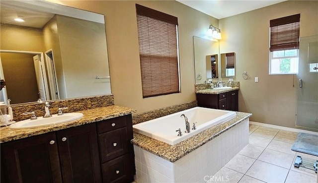 15048 Westin Ln, La Mirada, CA 90638 - full bath with two vanities, a bath, a stall shower, and tile patterned flooring