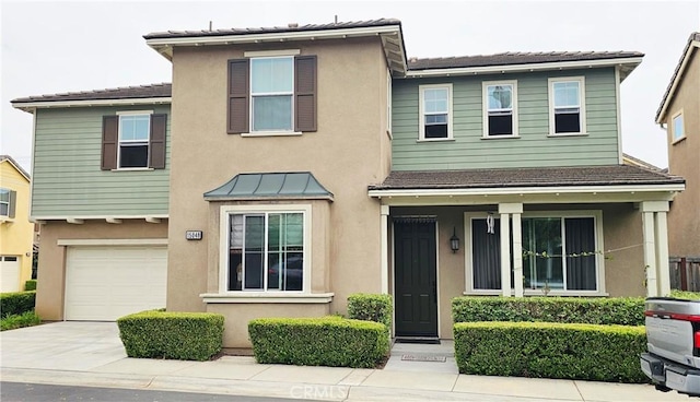 15048 Westin Ln, La Mirada, CA 90638 - traditional-style home with stucco siding, an attached garage, and driveway