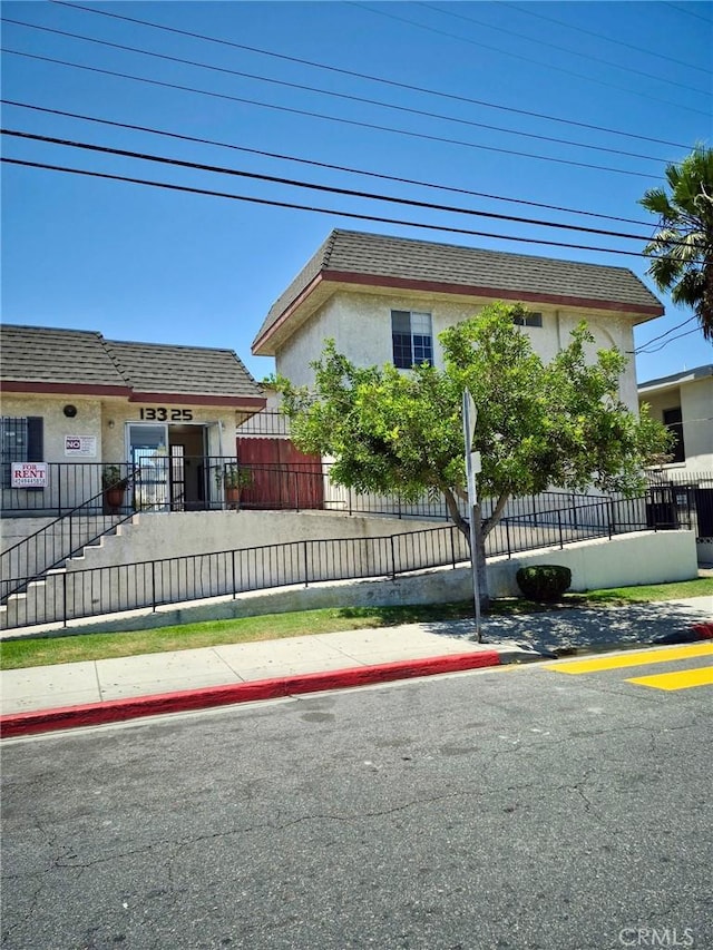 13325 Kornblum Ave, Hawthorne, CA 90250 - view of front of home featuring stucco siding