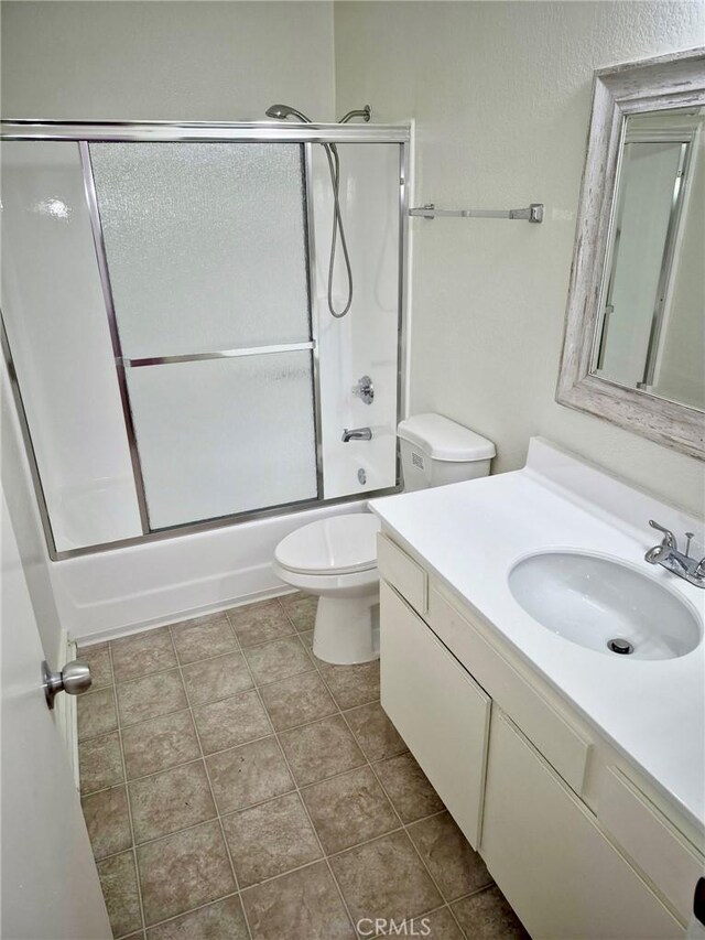 13325 Kornblum Ave, Hawthorne, CA 90250 - bathroom with vanity and bath / shower combo with glass door