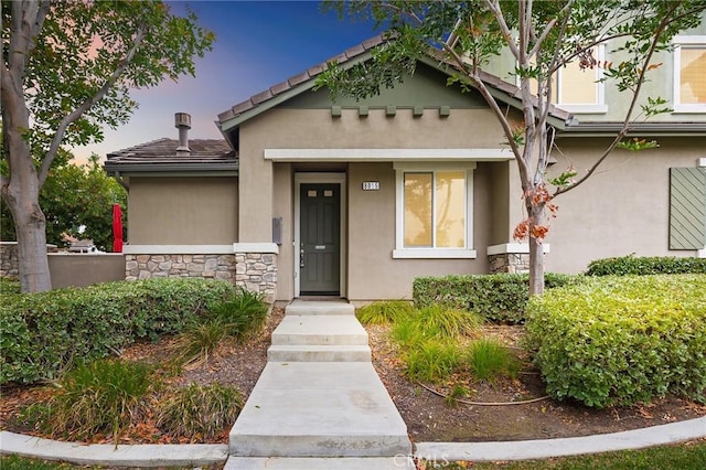 8015 Yeager St, Chino, CA 91708 - view of front of home featuring stucco siding and stone siding