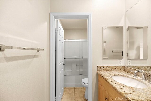 8015 Yeager St, Chino, CA 91708 - full bathroom with vanity, bath / shower combo with glass door, and tile patterned floors