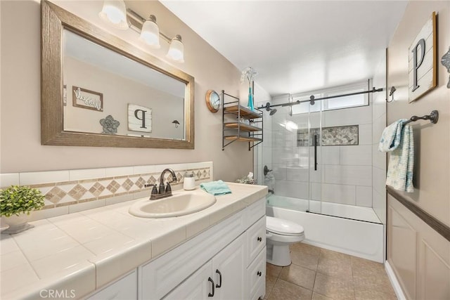 3112 N Hearthside St, Orange, CA 92865 - full bath with vanity, bath / shower combo with glass door, tile patterned flooring, and tasteful backsplash