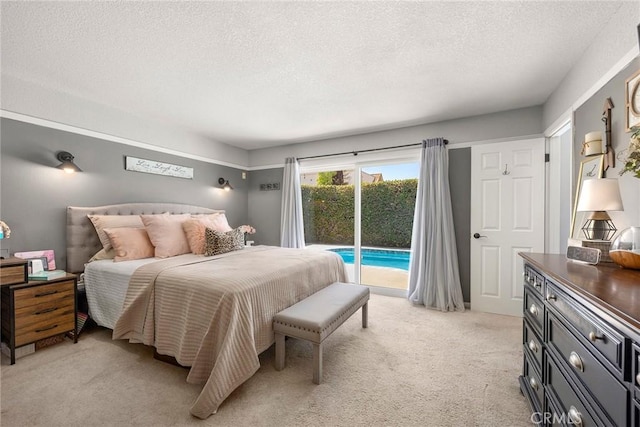 3112 N Hearthside St, Orange, CA 92865 - bedroom featuring access to outside, a textured ceiling, and light carpet