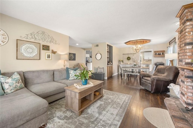 3112 N Hearthside St, Orange, CA 92865 - living room with hardwood / wood-style flooring and a chandelier